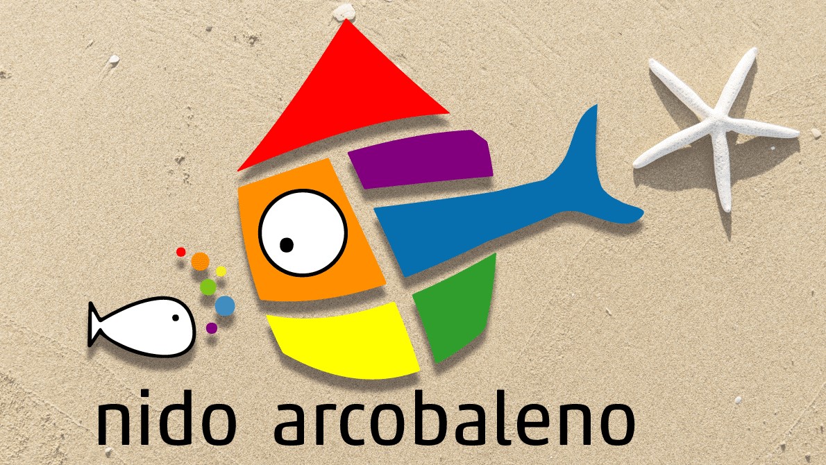 logo Arcobaleno su sfondo sabbia